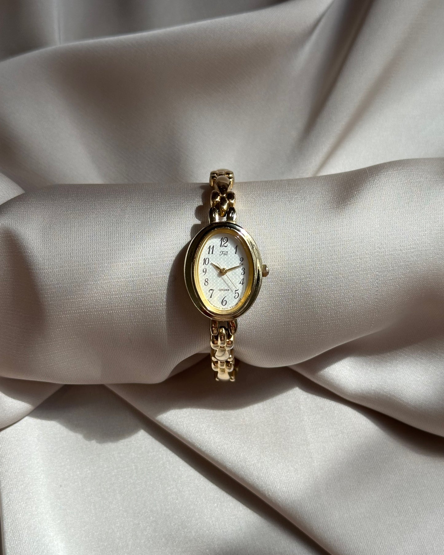Regal Oval Slim Gold Tone Watch by Citizen