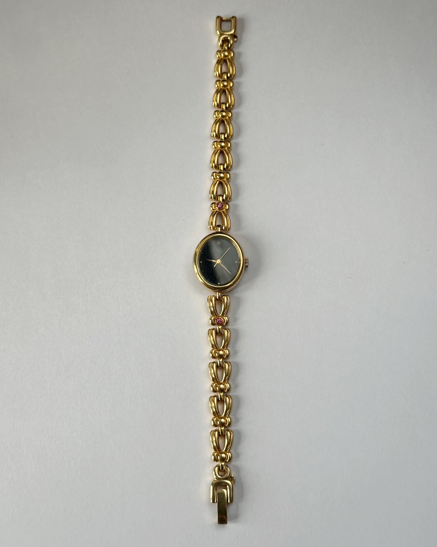 Black dial gold tone vintage watch by Orient