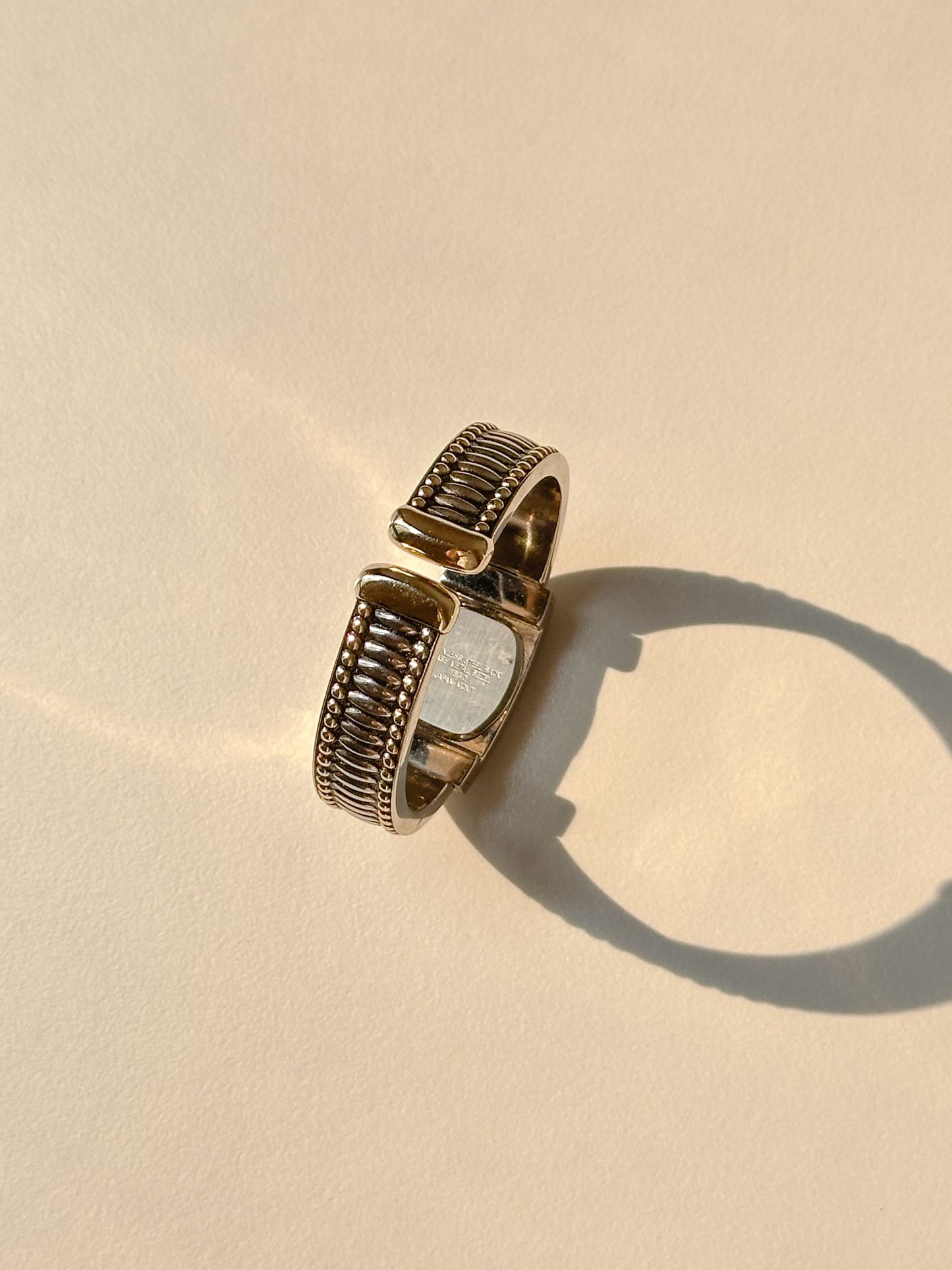 Cuff watch dual tone