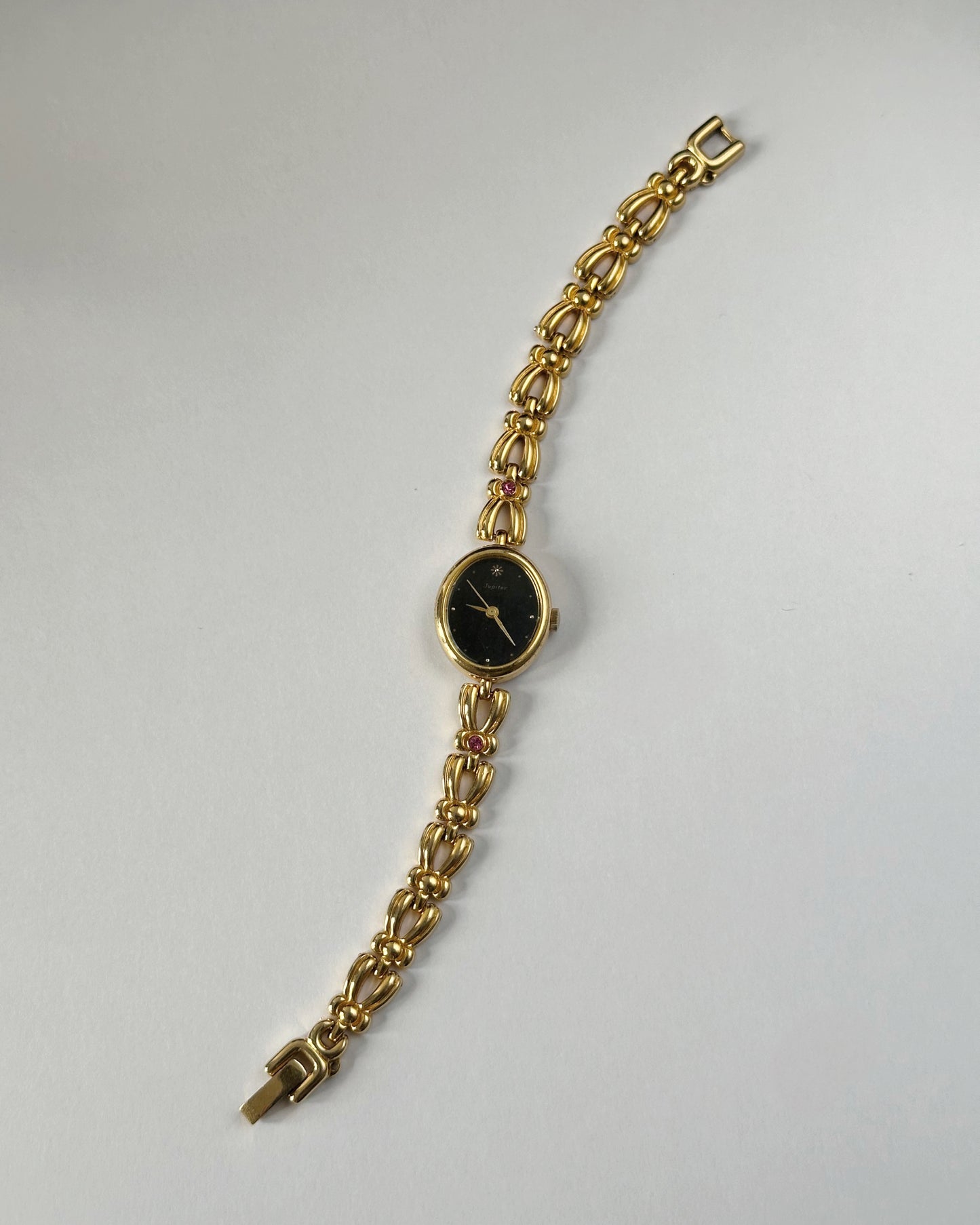 Gemstone gold tone bracelet watch