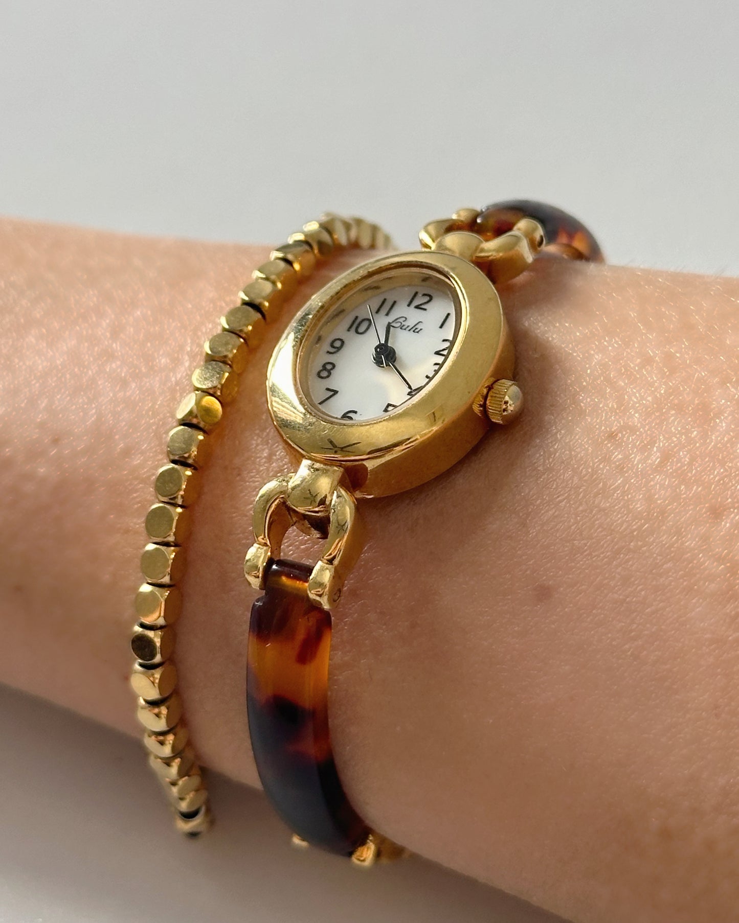 Modern vintage gold tone oval watch baignoire