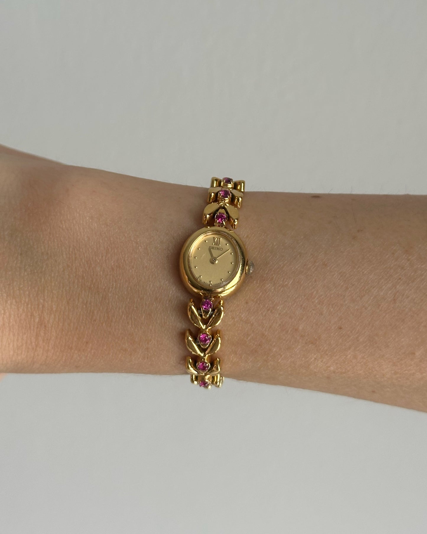 Seiko with pink gems