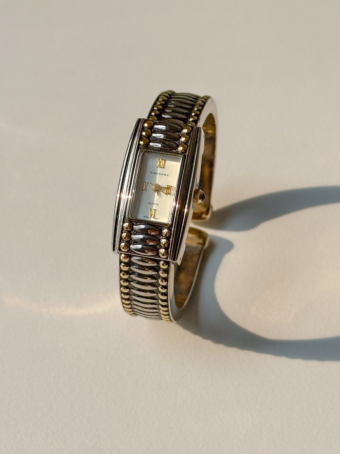 Sophisticated dual tone bangle watch