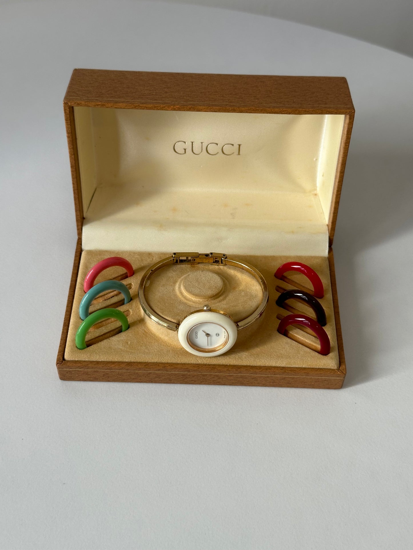 Gucci watch with changeable bezels