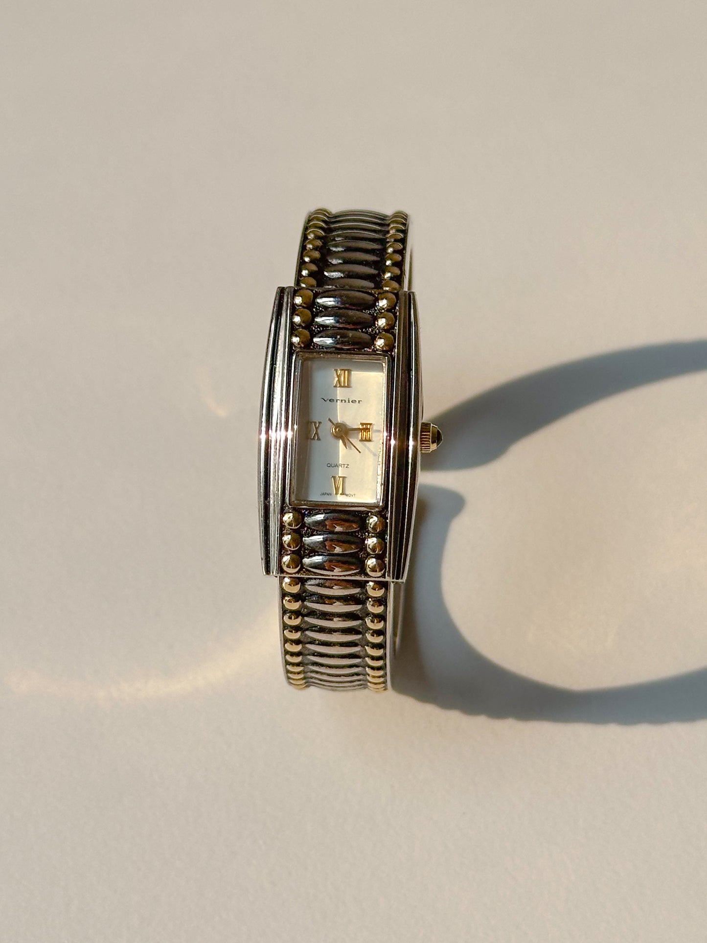 Vintage dual tone bangle watch
