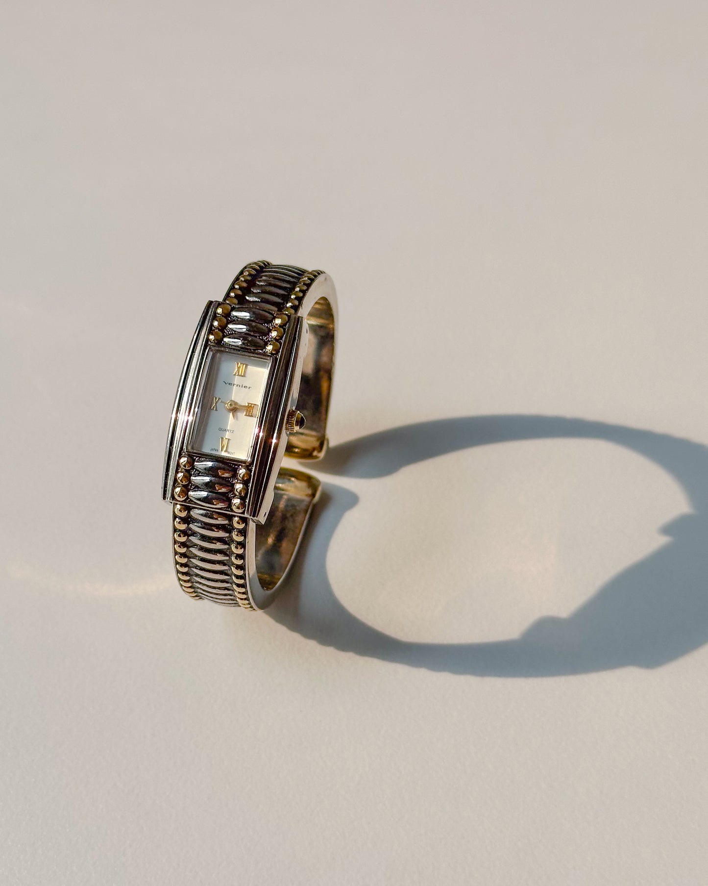dual tone bangle watch