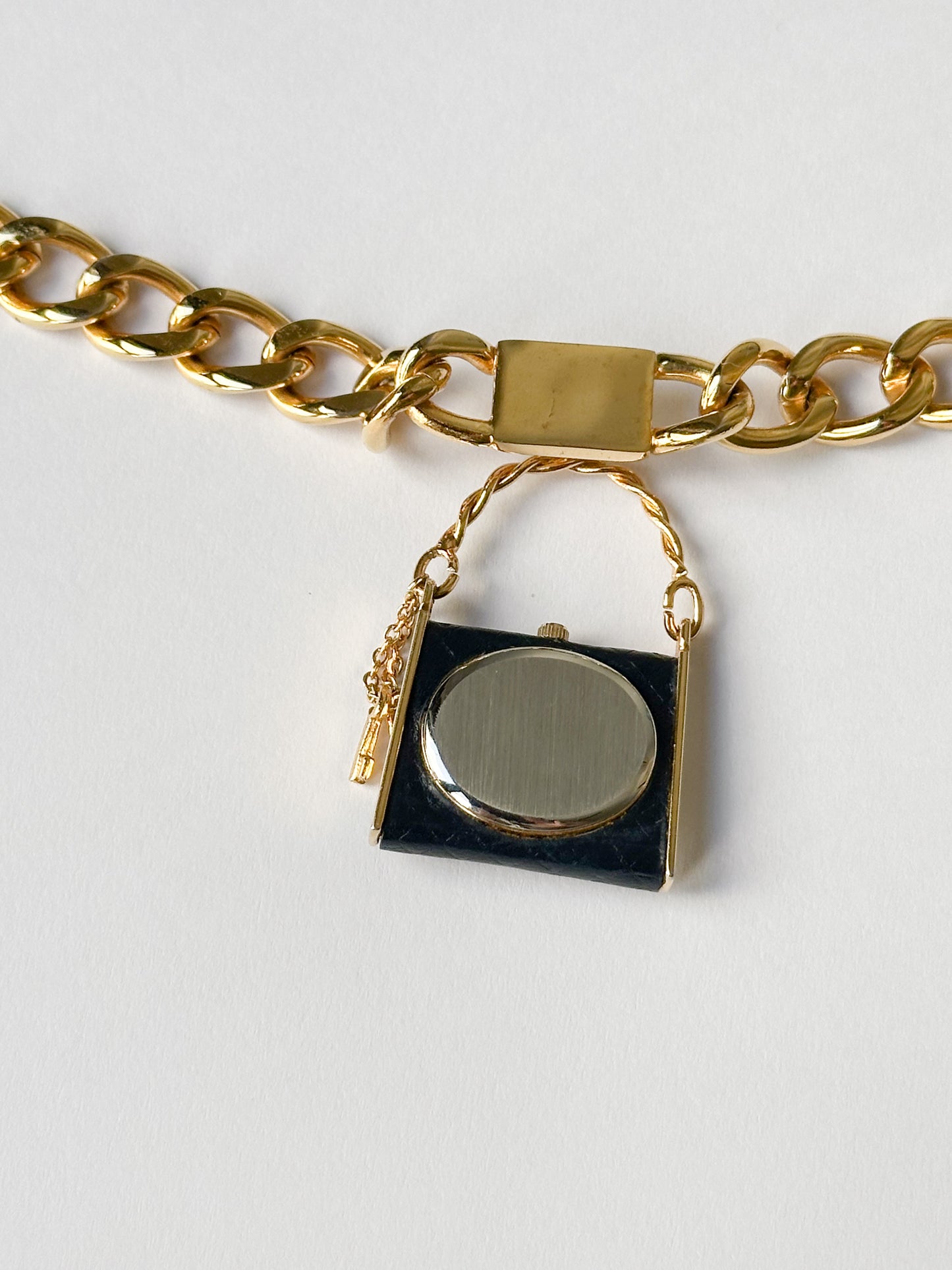purse watch back
