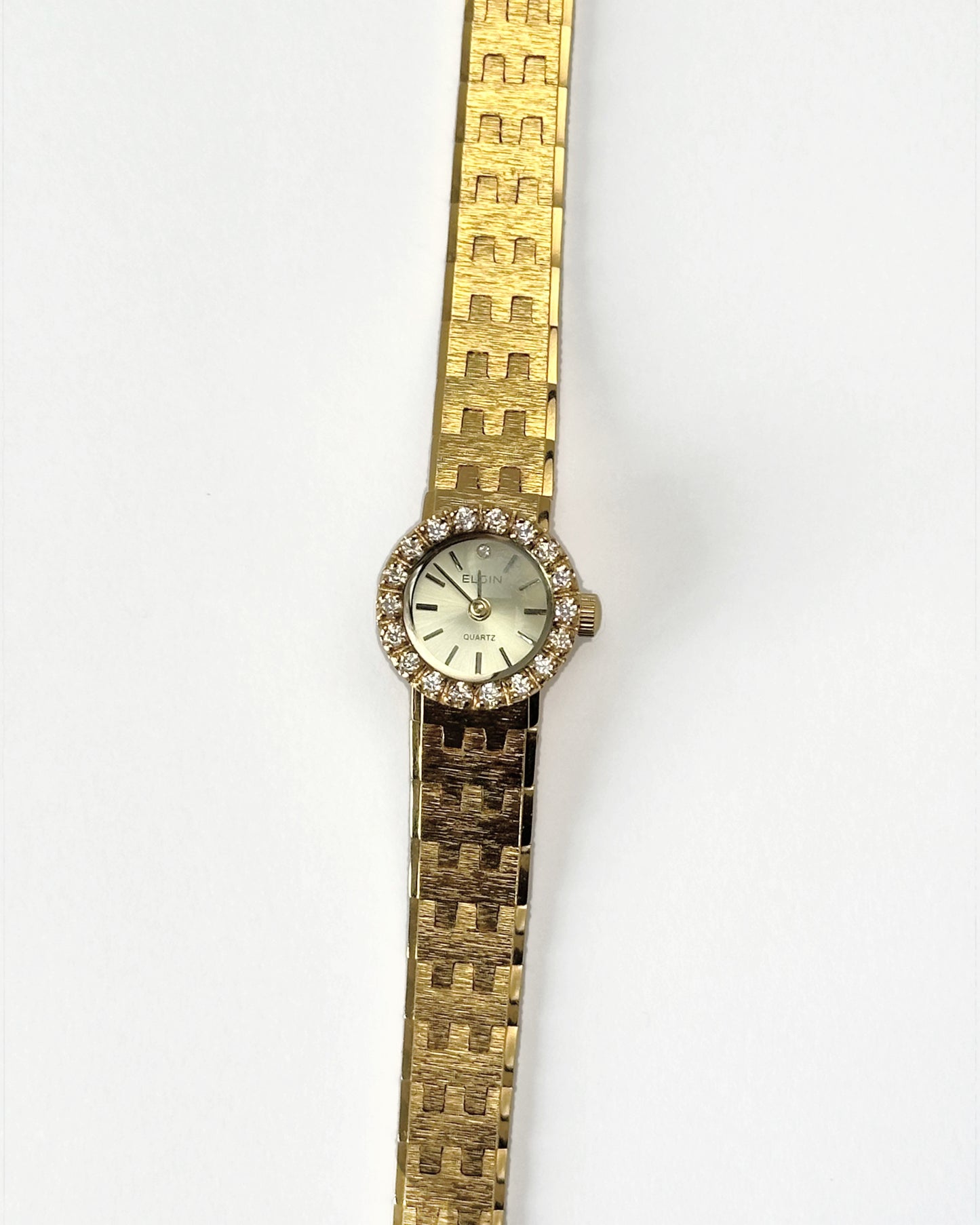 swiss made diamond bezel watch