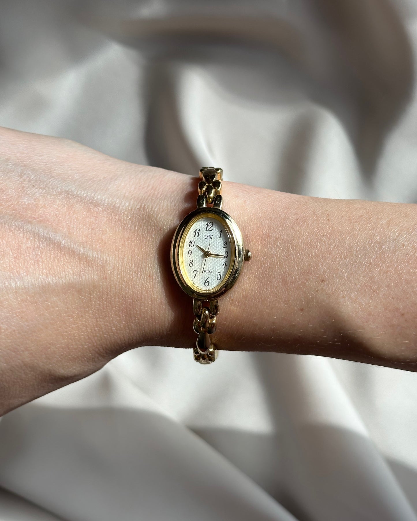 Regal Oval Slim Gold Tone Watch by Citizen