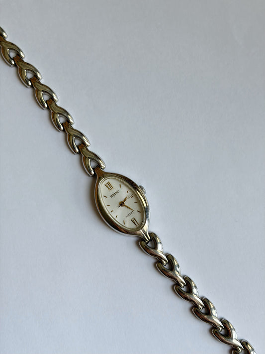 Seiko Lucent Elegant Oval Roman Dial Watch