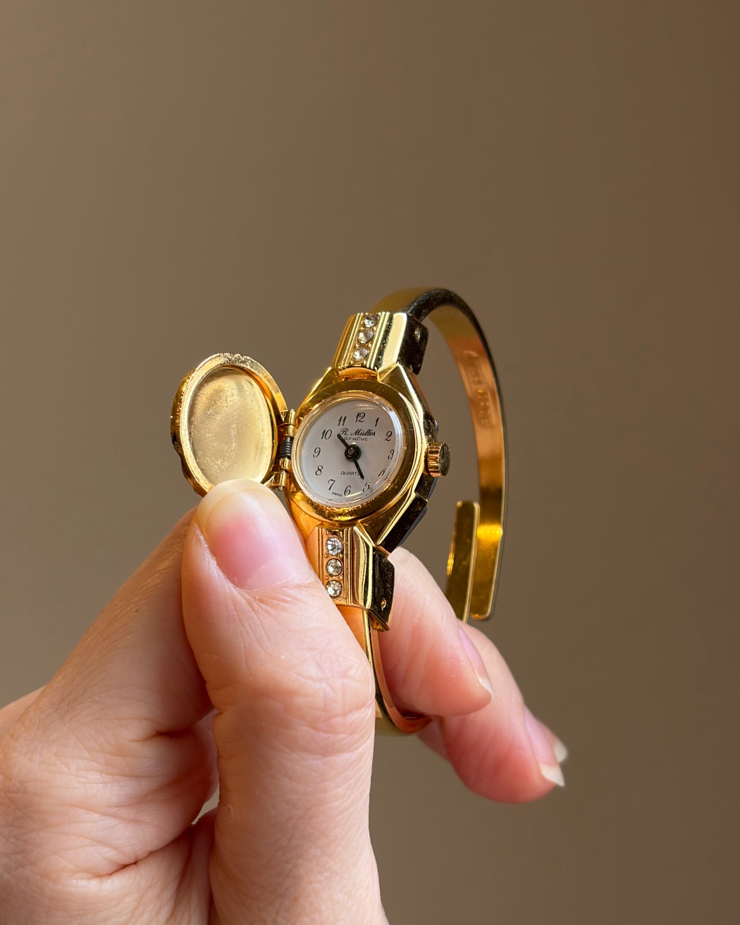 Swiss Made Golden Peek-a-Boo Crystal Watch