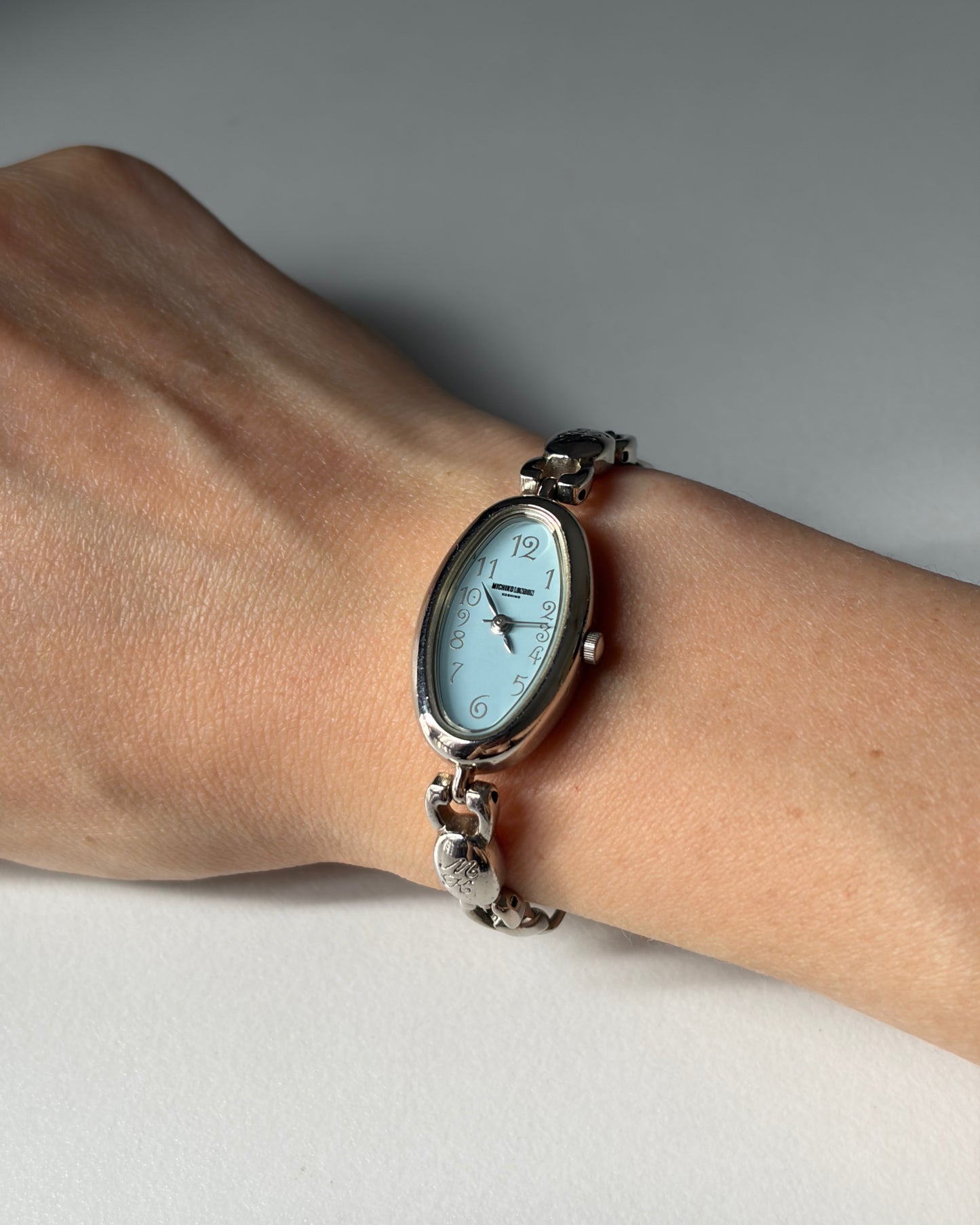 Silver Bloom Oval-Face Chain Watch