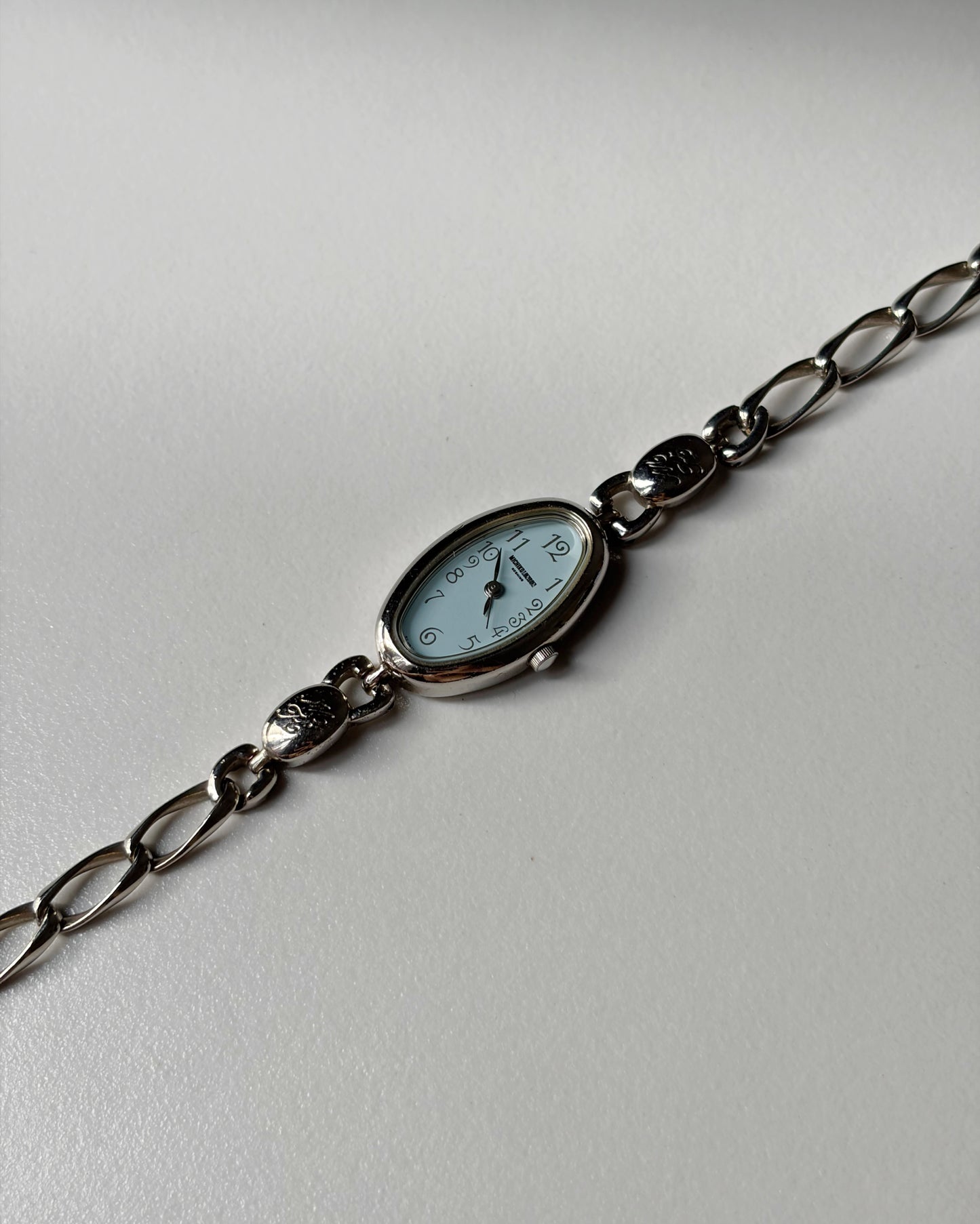 Silver Bloom Oval-Face Chain Watch