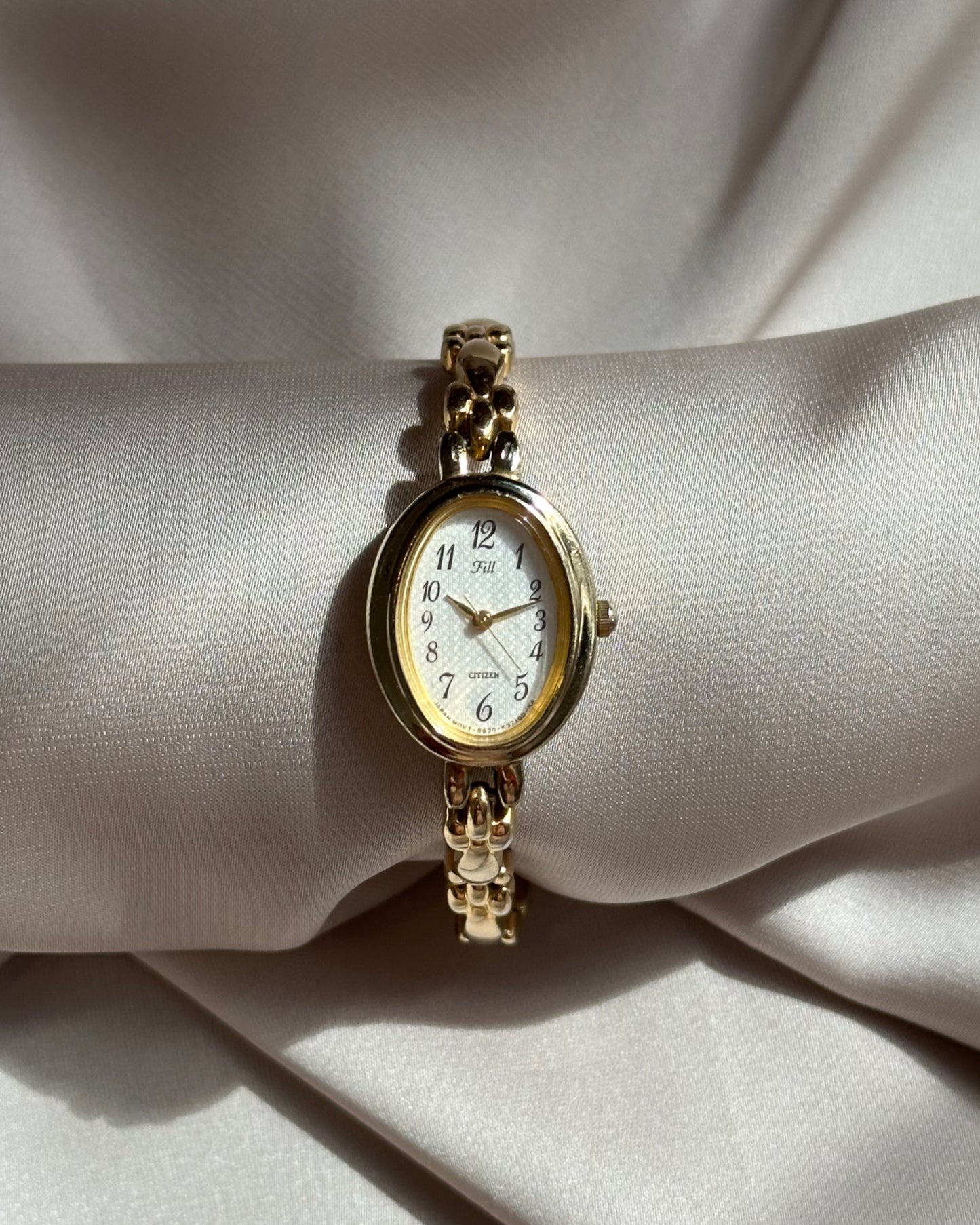 Regal Oval Slim Gold Tone Watch by Citizen