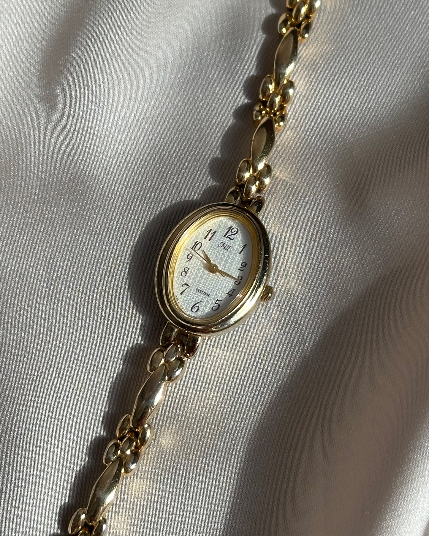Regal Oval Slim Gold Tone Watch by Citizen