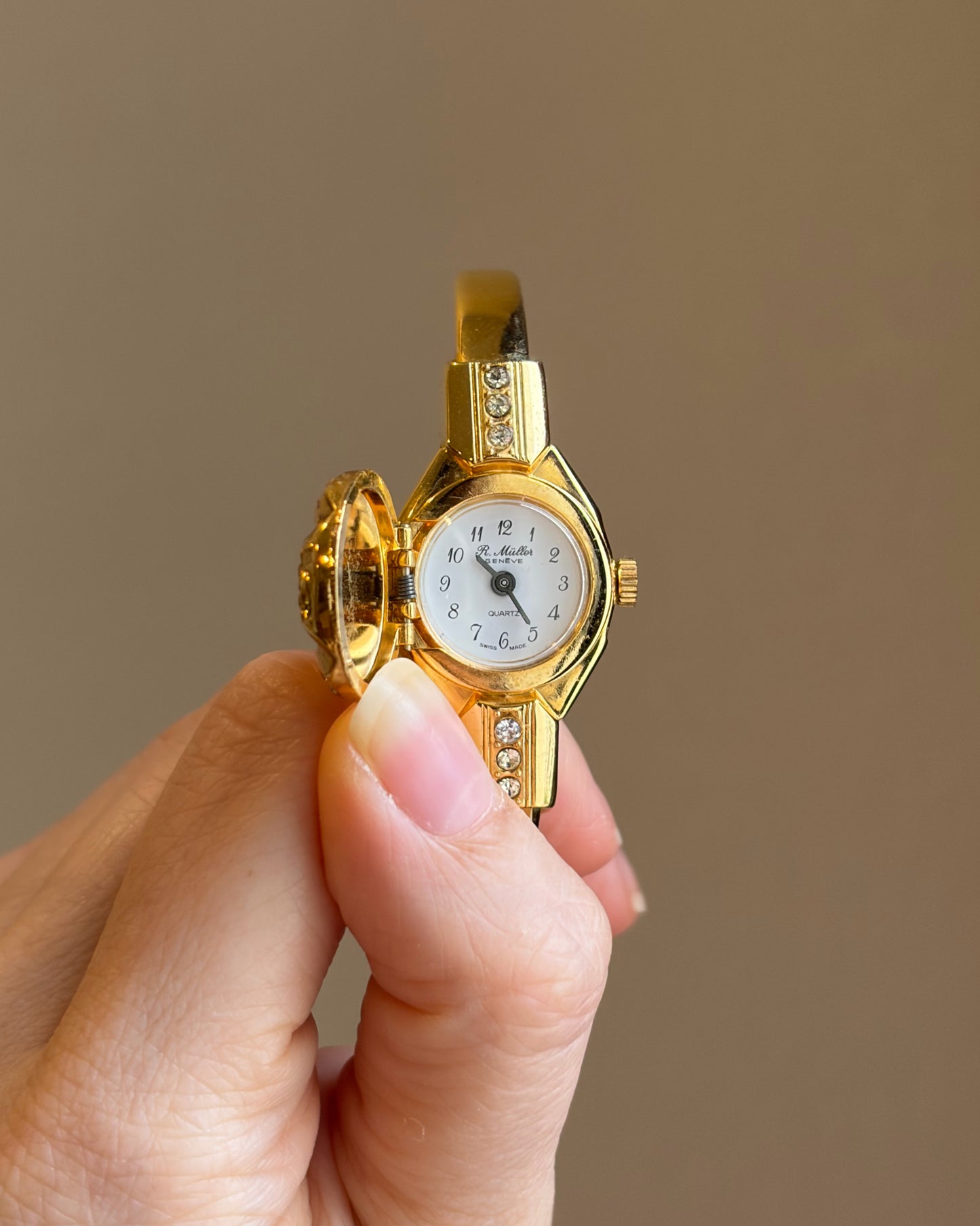 Swiss Made Golden Peek-a-Boo Crystal Watch