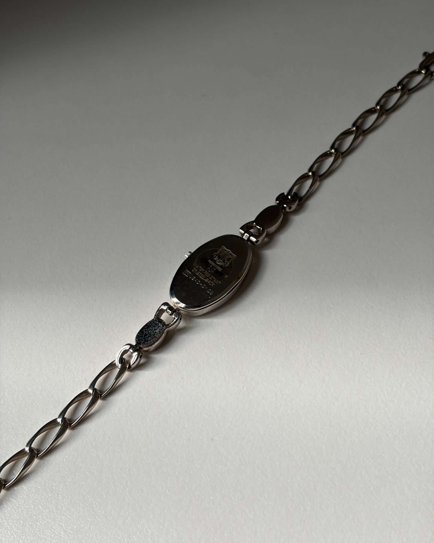 Silver Bloom Oval-Face Chain Watch