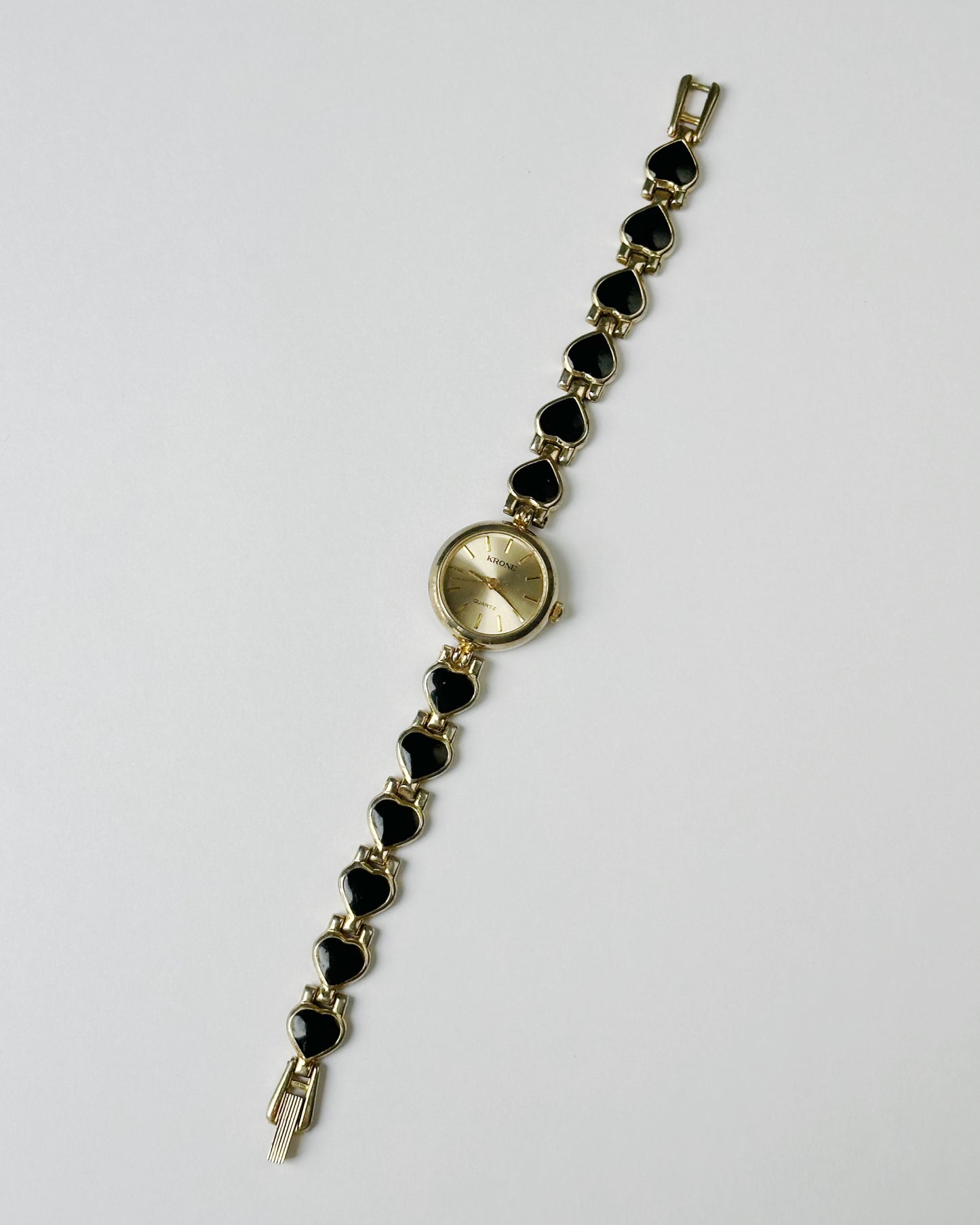 Black hearts gold vintage watch
