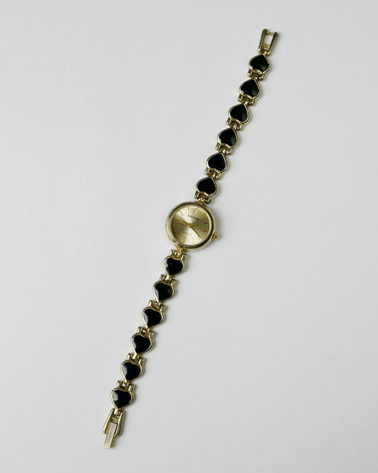 Black hearts gold vintage watch