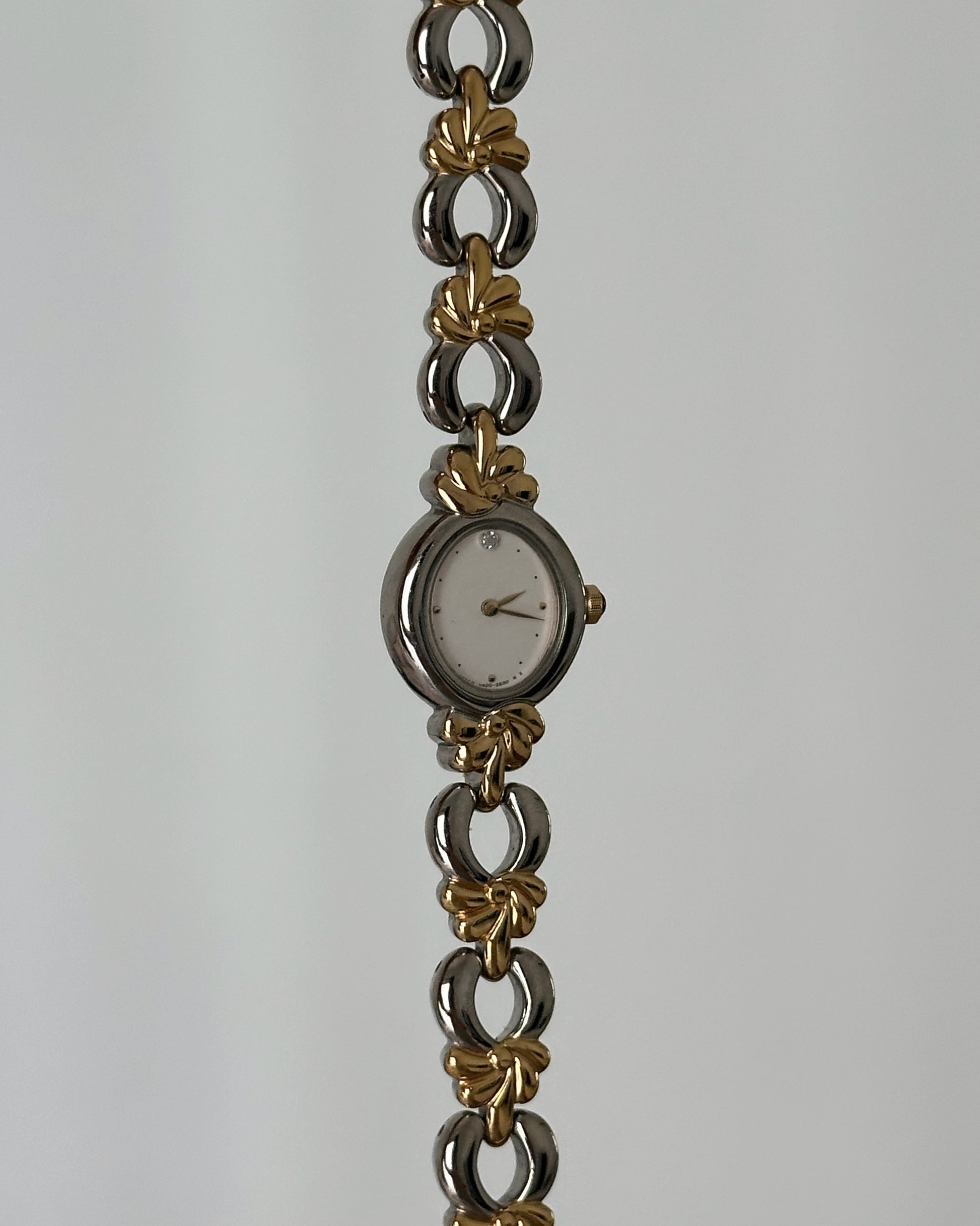 Dainty dual tone vintage women watch