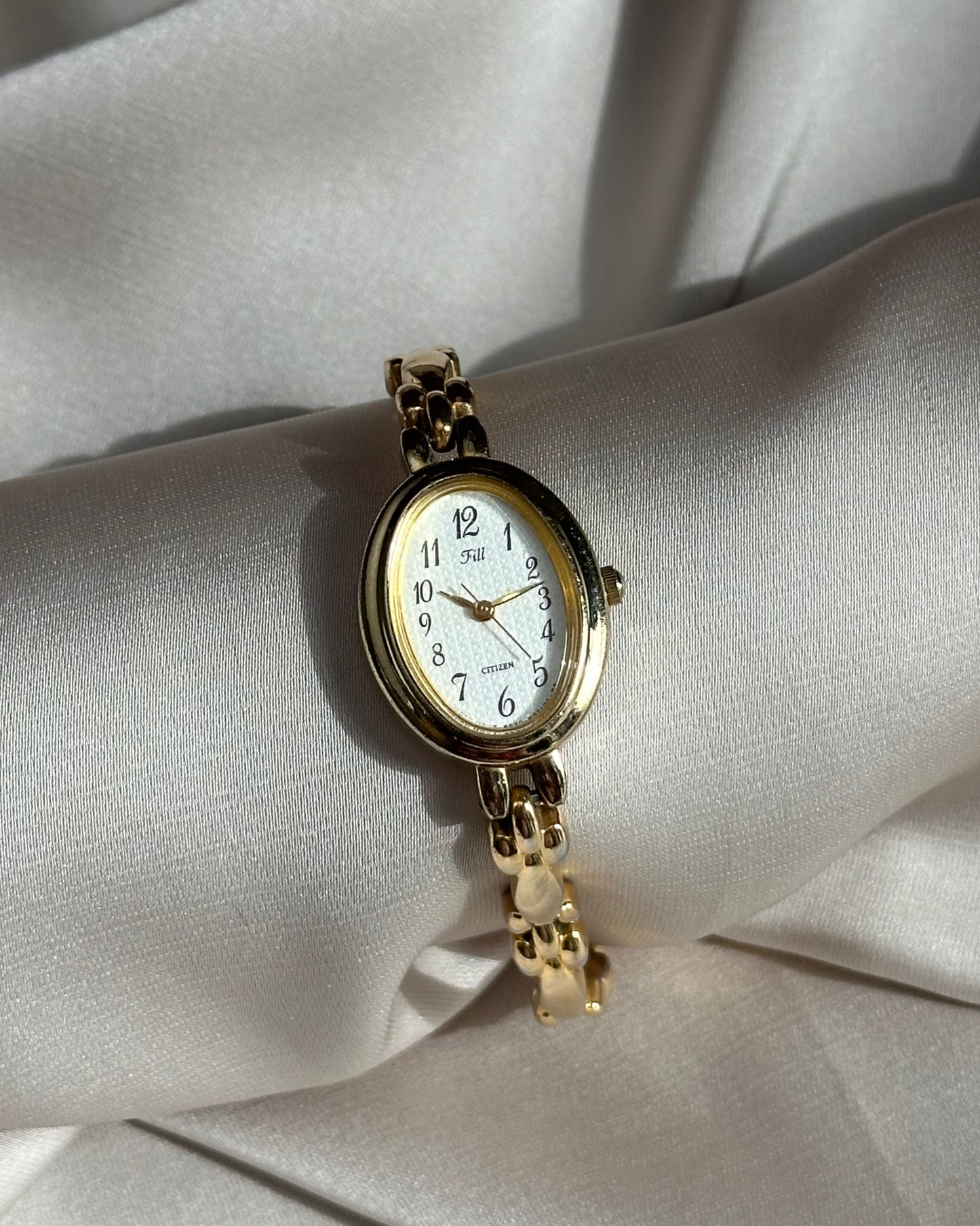 Regal Oval Slim Gold Tone Watch by Citizen