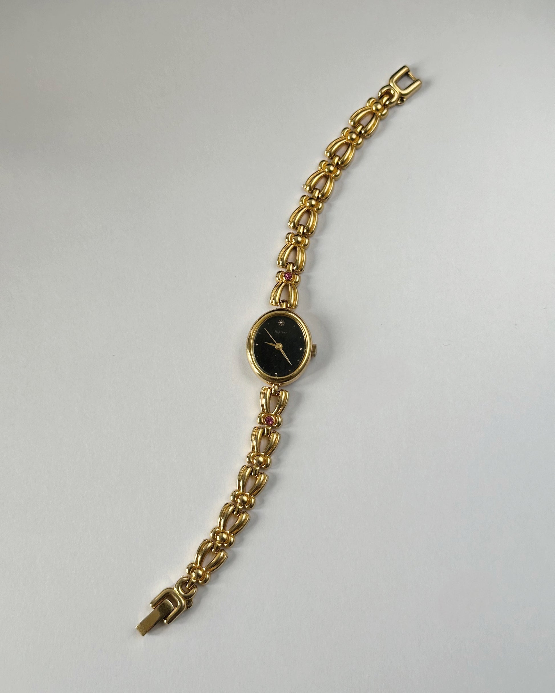 Gemstone gold tone bracelet watch