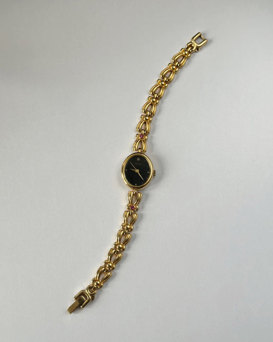 Gemstone gold tone bracelet watch