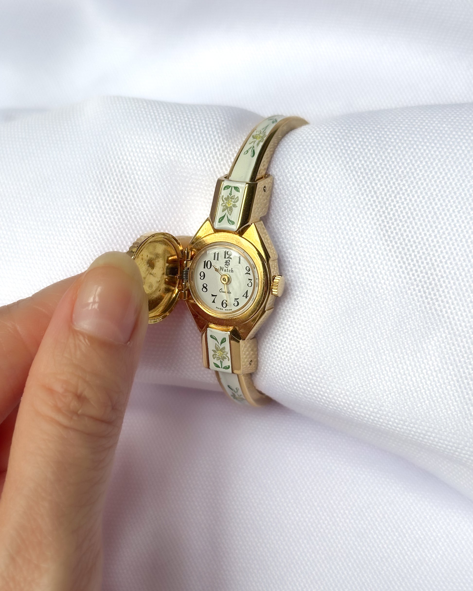 White peek-a-boo vintage watch andre mouche