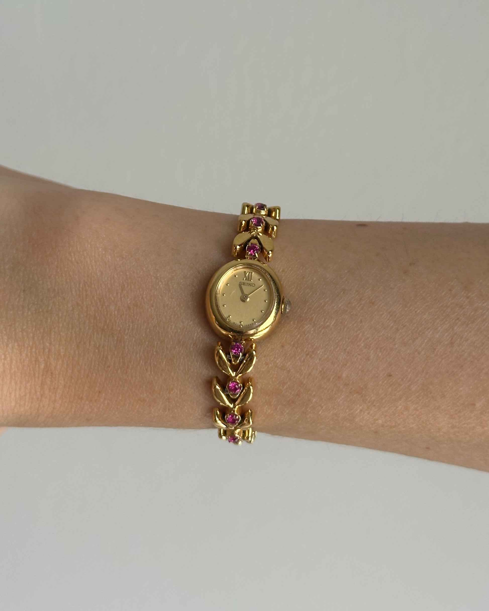 Seiko with pink gems