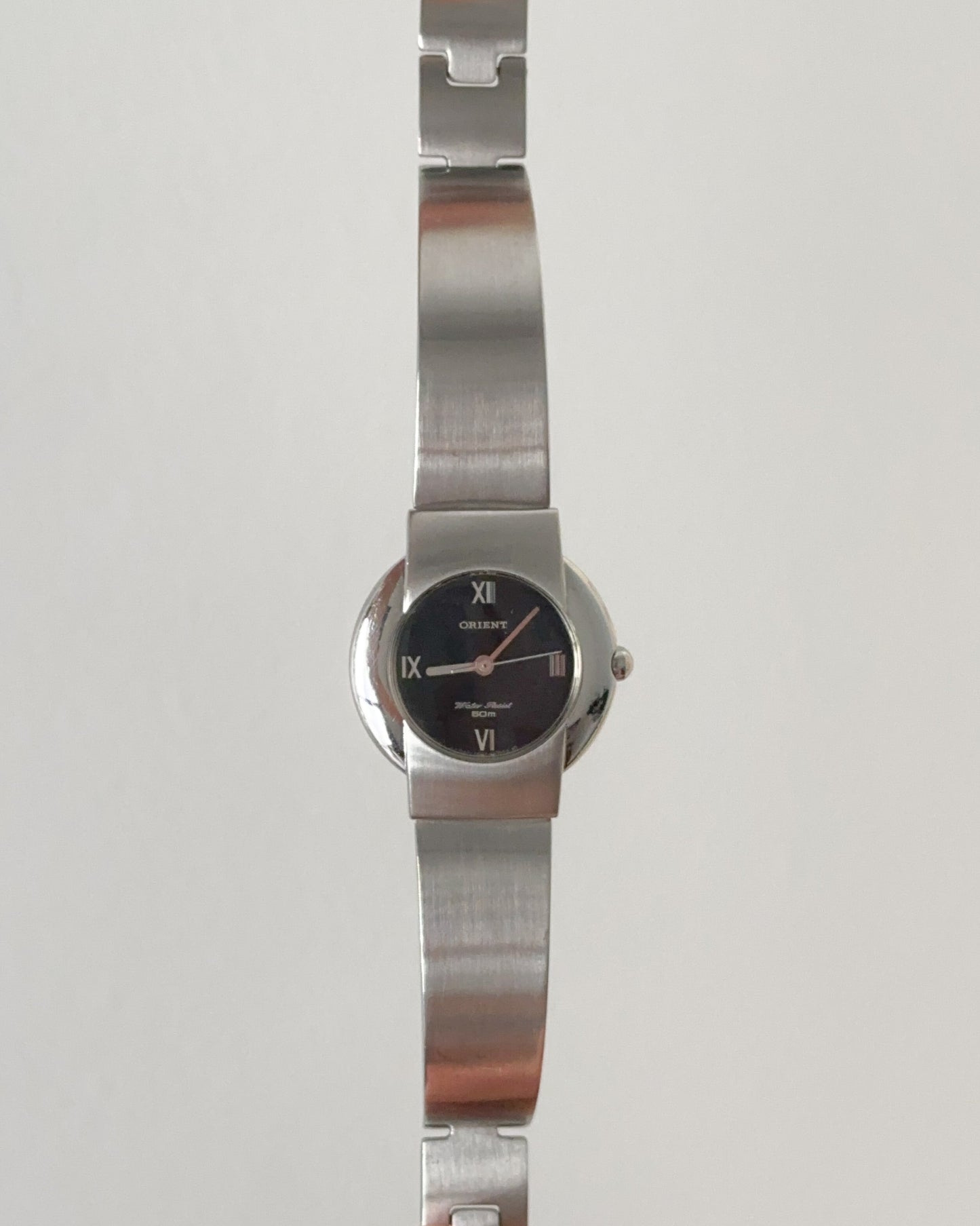 Steel vintage chrome Orient watch black dial